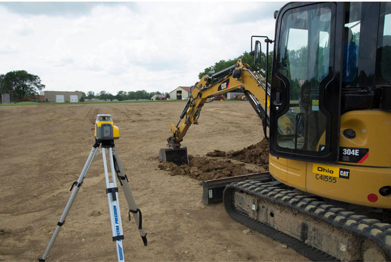 Compound slope laser guiding heavy equipment
