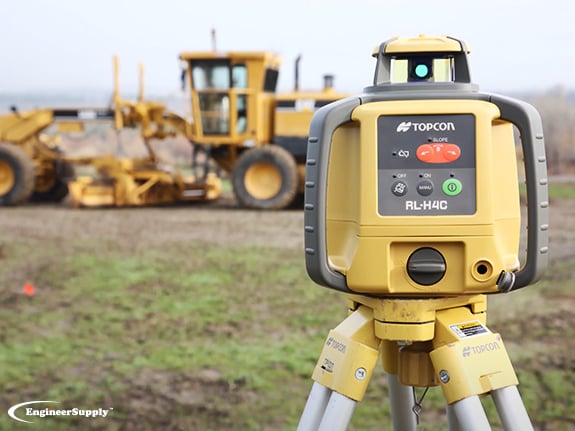 Compound slope laser guiding heavy equipment