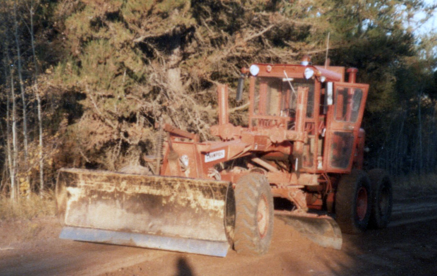 Municipal motor grader in operation